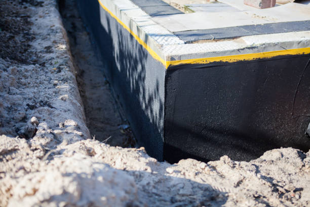 Professional Wet Basement Repair technician working in Greensboro, IN